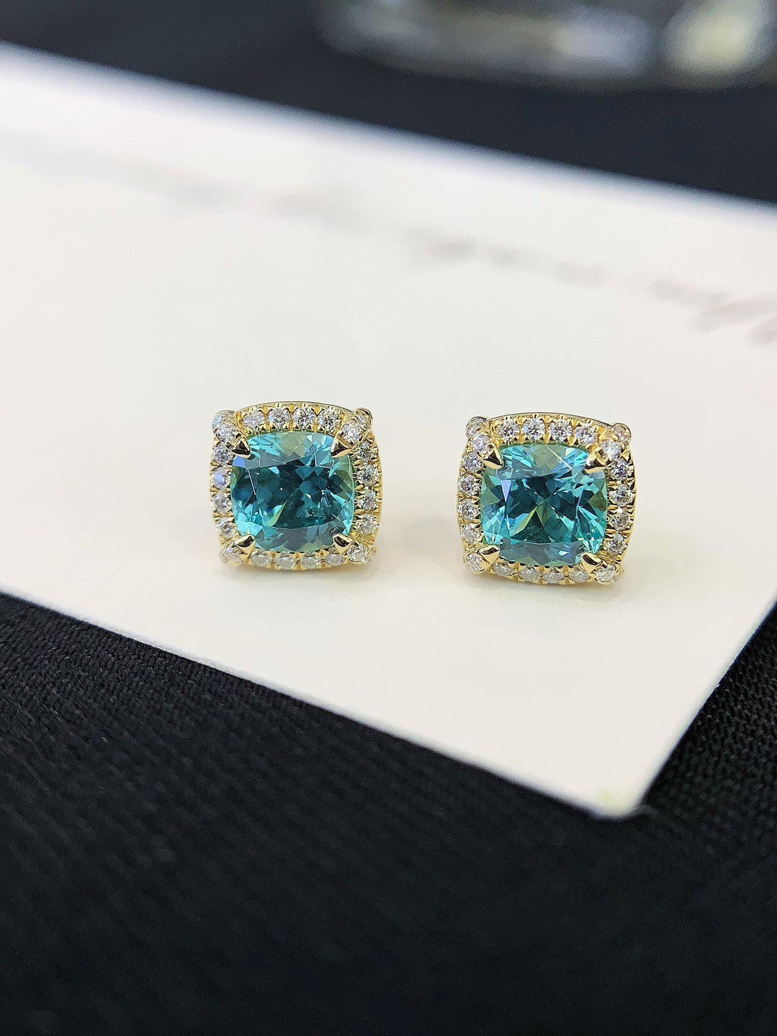 Catching More Than Attention Cushion Blue Diamond Halo Studs