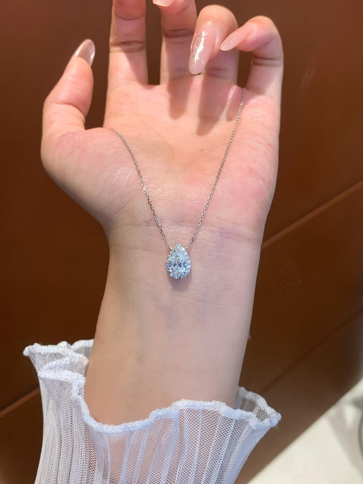 Impossible to Look Away Pear Diamond Halo Necklace