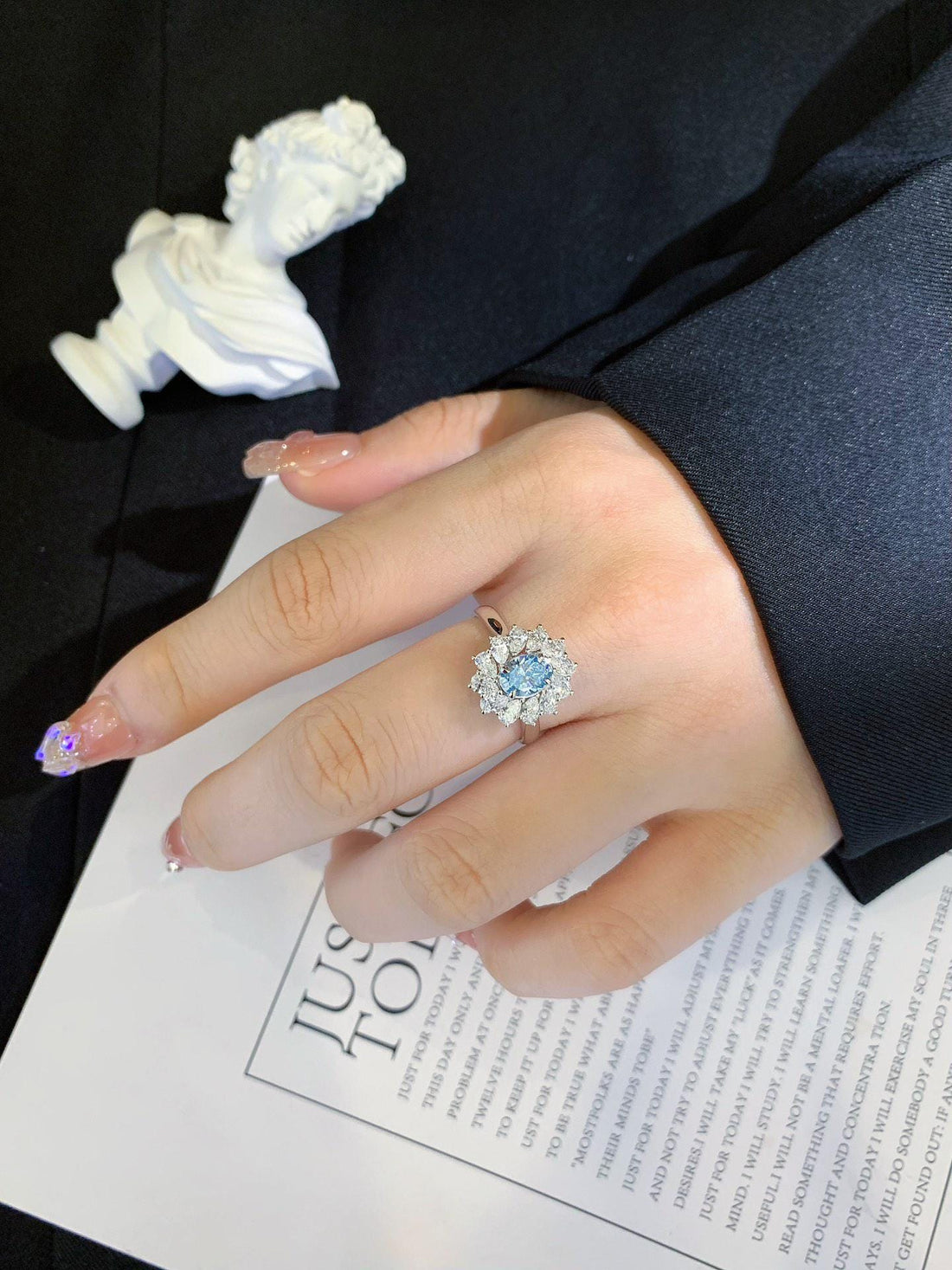 Pure Brilliance Blue Moissanite Floral Halo Ring